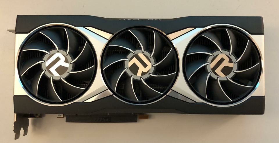 Representative AMD Radeon RX 6900 XT reference-design board physical card, photographed from the front