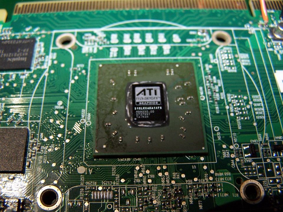 Representative Radeon HD 2400 RV610 GPU package on an exposed board physical card, photographed from the front