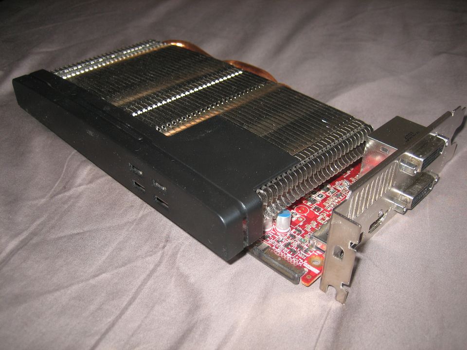 Angled front of a PowerColor SCS3 Radeon HD 5750 PCIe board with large passive heatsink