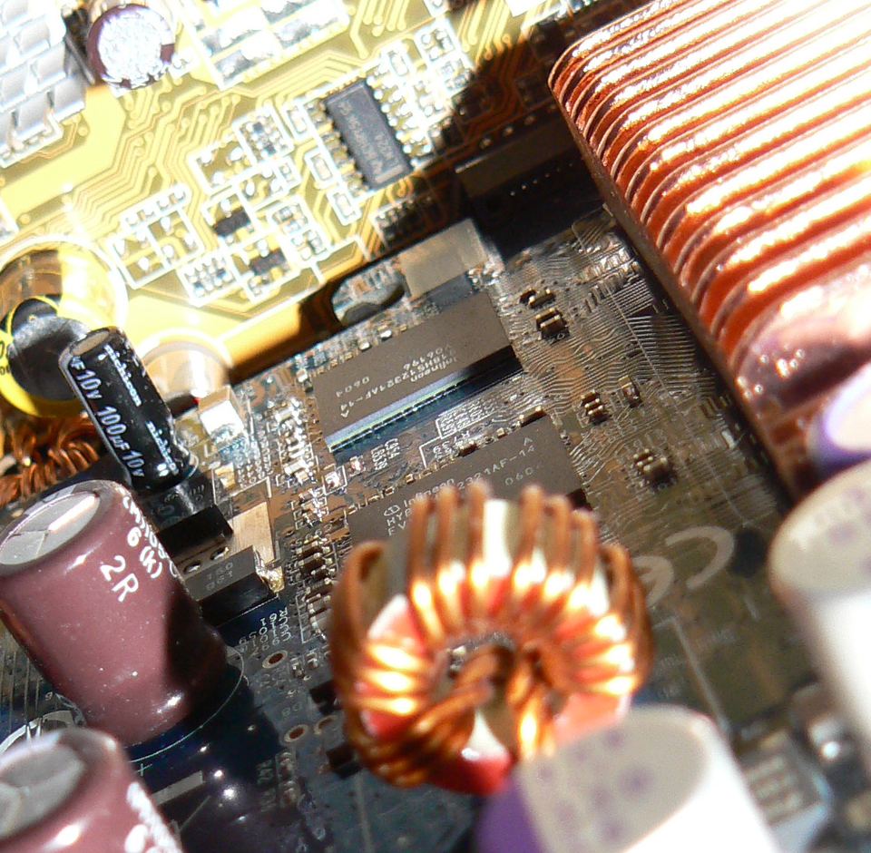 Close-up of two GDDR3 memory chips on a board identified by the source as GeForce 7600 GT