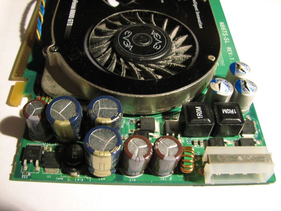 Representative EVGA GeForce 8600 GTS PCIe board, capacitor repair view physical card, photographed from the front