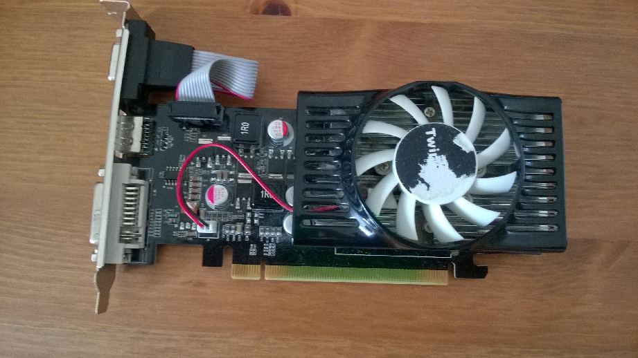 Representative GeForce GT 220 1 GB PCIe board physical card, photographed from the front