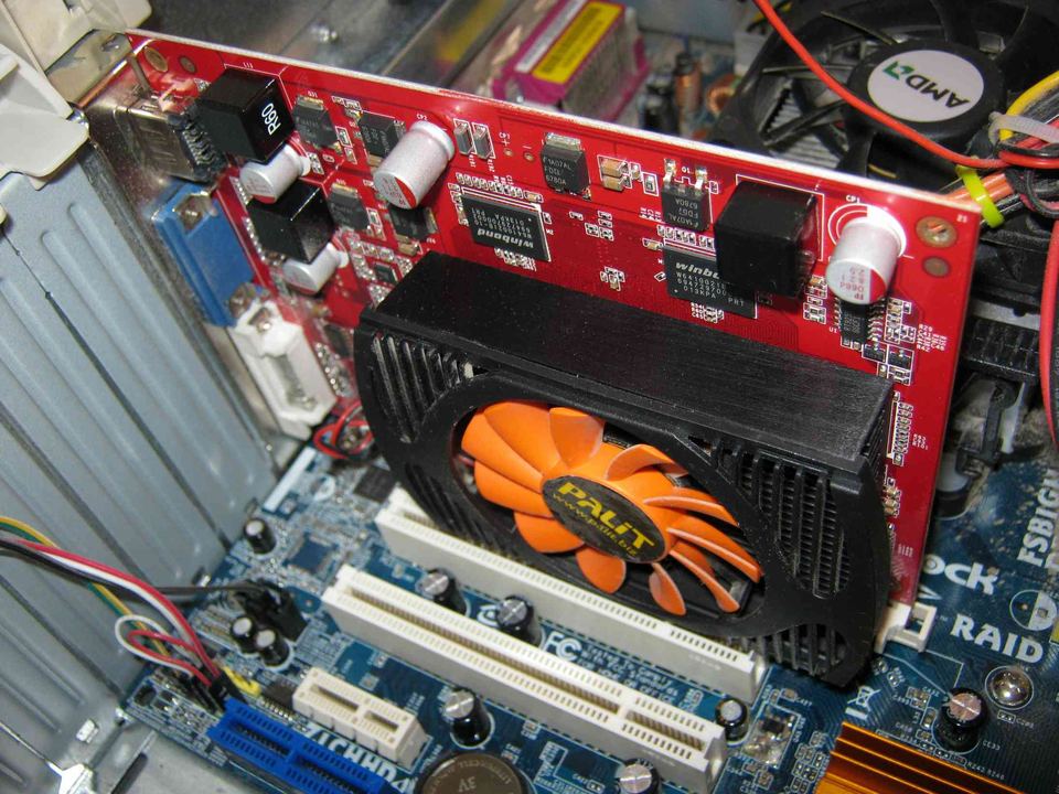Representative Palit GeForce GT 240 PCIe board installed in a PC physical card, photographed from the front