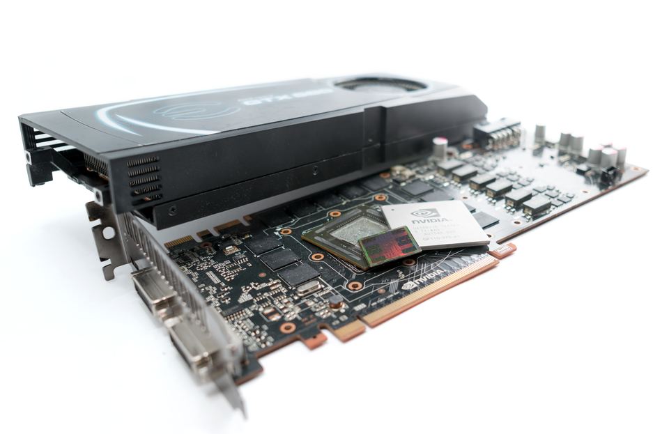 Representative NVIDIA GeForce GTX 580 PCIe board with cooler lifted physical card, photographed from the front