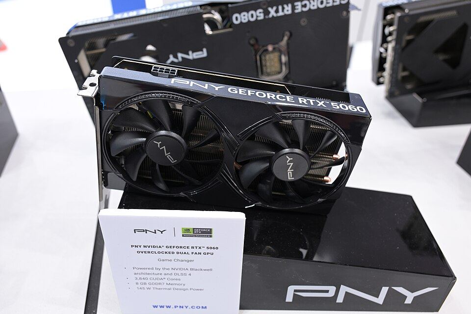 Representative PNY GeForce RTX 5060 exhibition board physical card, photographed from the front