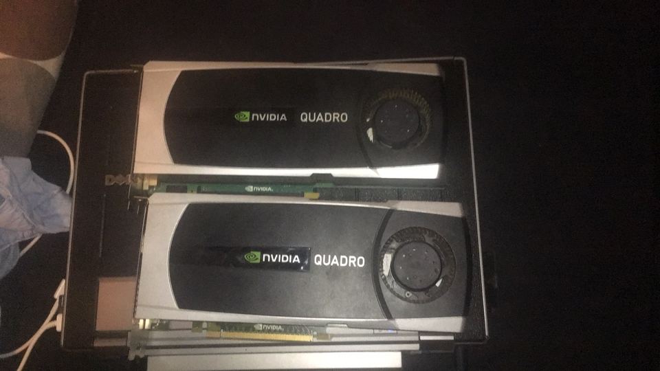 Two NVIDIA Quadro 6000 PCIe cards stacked together with Quadro shrouds