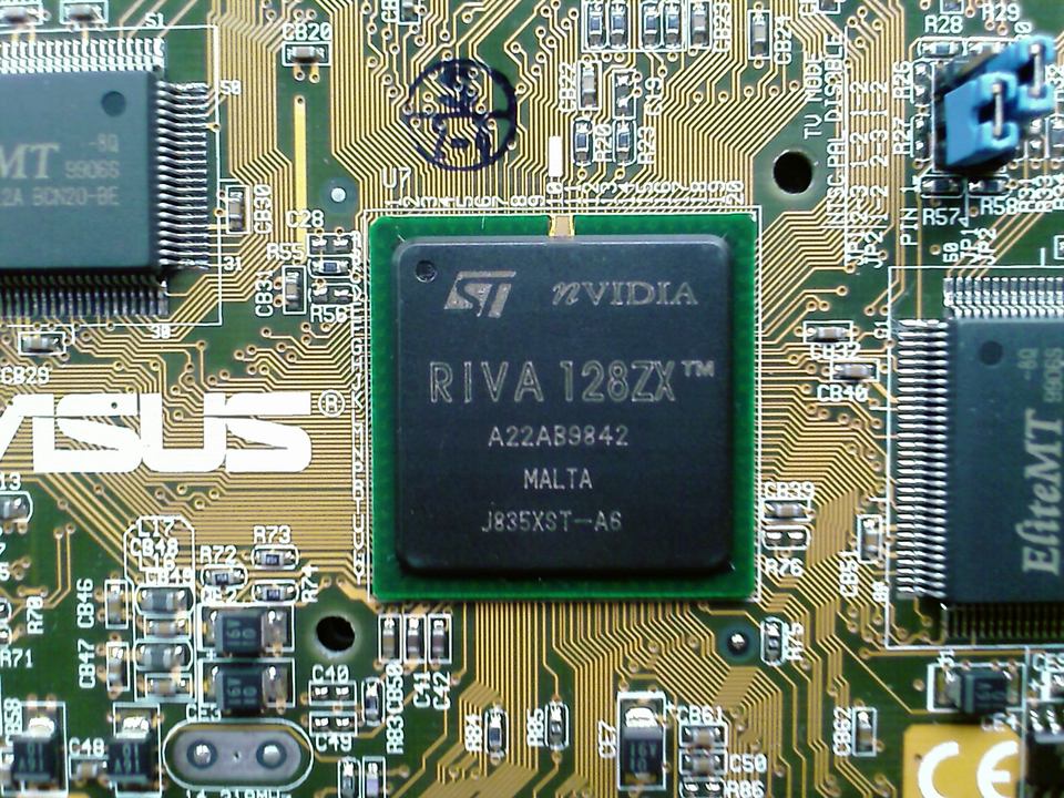 Close-up of an NVIDIA RIVA 128ZX GPU chip mounted on an ASUS graphics board