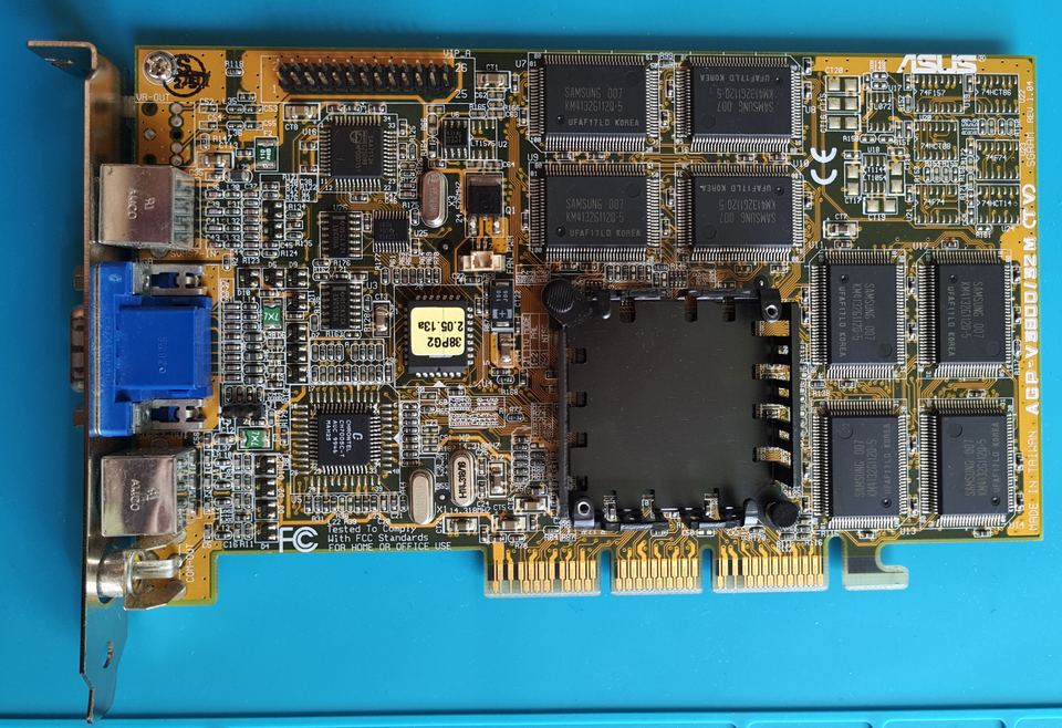 Representative ASUS AGP-V3800/32M TV RIVA TNT2 AGP board physical card, photographed from the front