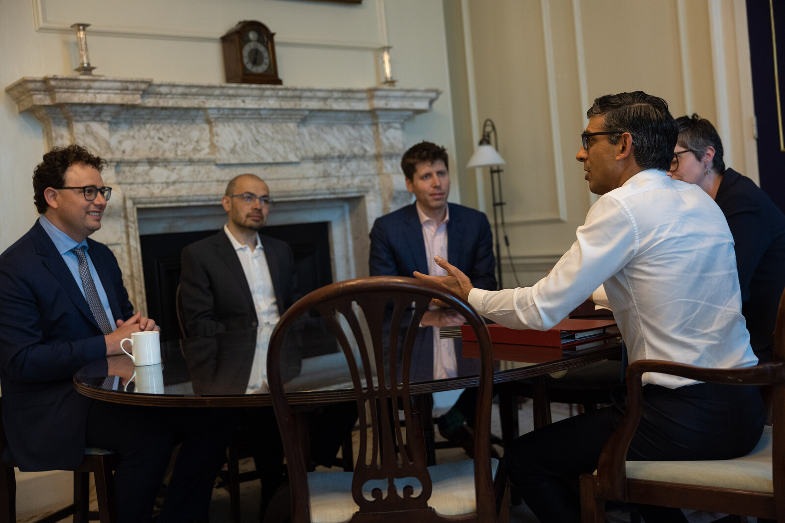 Demis Hassabis, Dario Amodei, and Sam Altman meeting at 10 Downing Street in May 2023