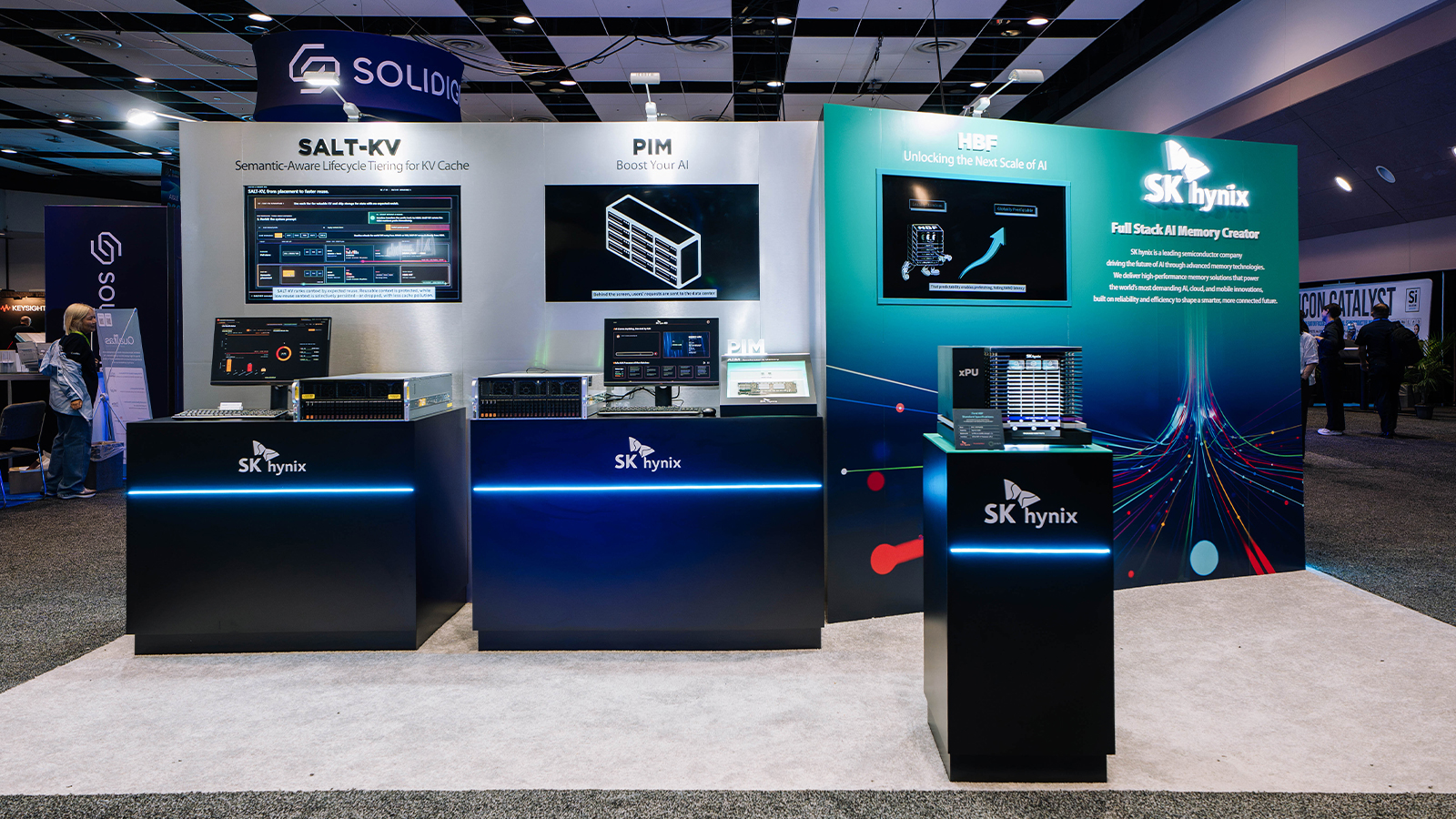 The SK hynix stand at AI Infra Summit 2026, with separate SALT-KV and PIM demonstration stations.