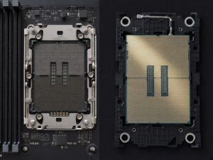 Overhead view of an empty Intel LGA4677 server socket on a motherboard next to a Xeon processor in its black carrier, contacts up, on anti-static foam.